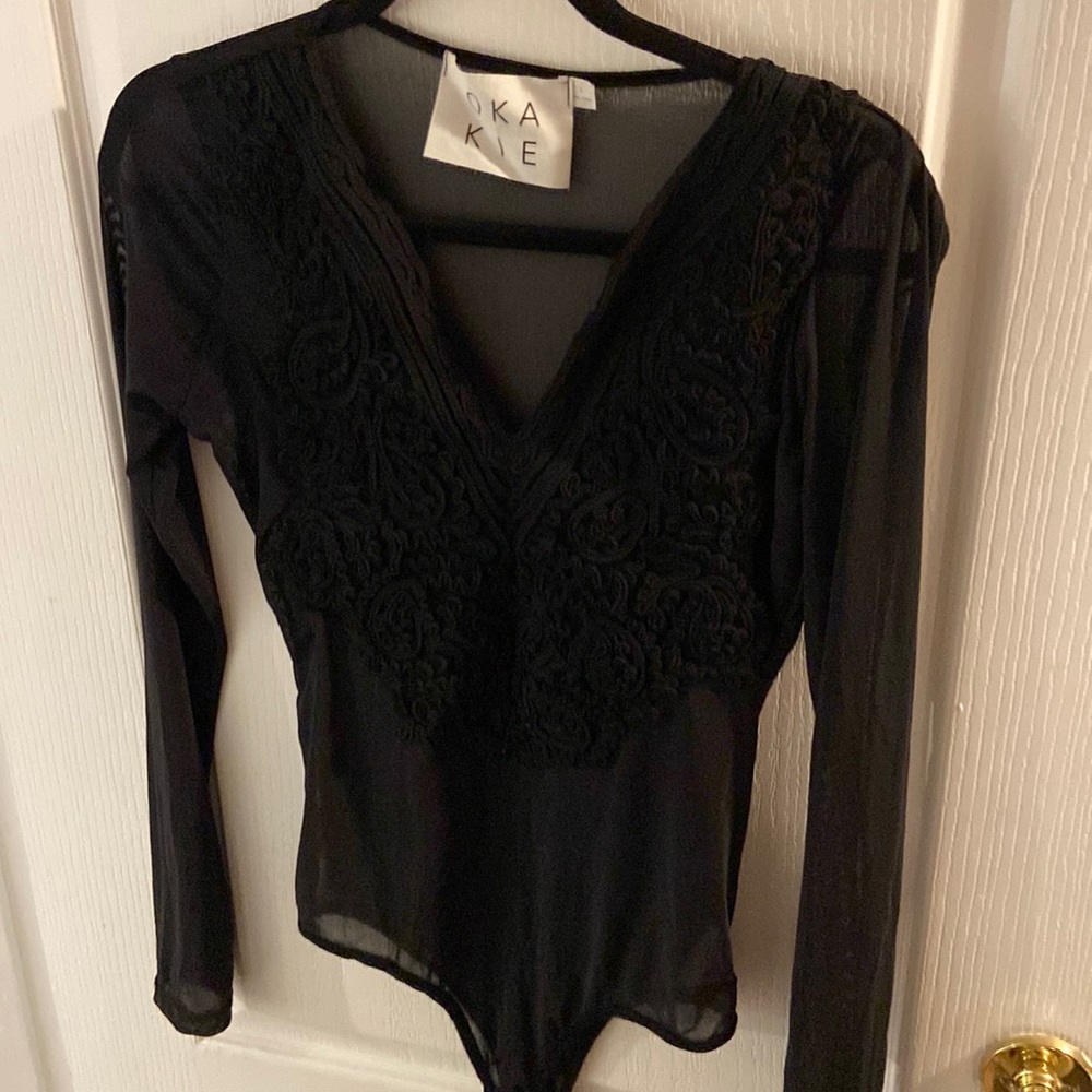 Black Okakie bodysuit with black appliqué